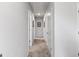 Neutral hallway leads to other rooms in the home at 151 Brasch Park Dr, Grantville, GA 30220