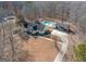 Ranch home with pool and detached garage; nestled in a wooded area at 130 Seneca Pl, Fayetteville, GA 30215