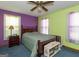Cozy bedroom with double bed, nightstand, and ample natural light at 130 Seneca Pl, Fayetteville, GA 30215