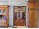 View down a hardwood hallway from the kitchen area at 130 Seneca Pl, Fayetteville, GA 30215