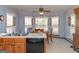 Kitchen features wood cabinets, a breakfast nook, and bay windows at 130 Seneca Pl, Fayetteville, GA 30215