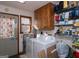 Laundry room with washer, dryer, and built-in shelving at 130 Seneca Pl, Fayetteville, GA 30215