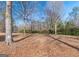 Spacious backyard with mature trees and open space at 130 Seneca Pl, Fayetteville, GA 30215