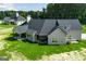 House with large backyard, covered patio, and detached garage at 1291 Pleasant Grove Church Rd, Villa Rica, GA 30180