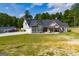 House with large backyard, detached garage and driveway at 1291 Pleasant Grove Church Rd, Villa Rica, GA 30180
