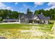 House with large backyard, detached garage, and driveway at 1291 Pleasant Grove Church Rd, Villa Rica, GA 30180