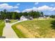 Aerial view of house and property with carport at 1291 Pleasant Grove Church Rd, Villa Rica, GA 30180