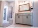 Clean bathroom with gray vanity, white toilet and marble-look floors at 1291 Pleasant Grove Church Rd, Villa Rica, GA 30180