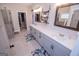 Elegant bathroom with double vanity and a large walk-in shower at 1291 Pleasant Grove Church Rd, Villa Rica, GA 30180