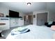 Bedroom with a large TV and built in storage at 1291 Pleasant Grove Church Rd, Villa Rica, GA 30180