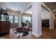 Open entryway with hardwood floors, unique rug and access to other rooms at 1291 Pleasant Grove Church Rd, Villa Rica, GA 30180