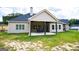 House exterior showcasing a large patio and backyard at 1291 Pleasant Grove Church Rd, Villa Rica, GA 30180