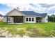 Back exterior view of house with covered patio at 1291 Pleasant Grove Church Rd, Villa Rica, GA 30180