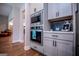 Modern kitchen features stainless steel appliances and updated cabinetry at 1291 Pleasant Grove Church Rd, Villa Rica, GA 30180