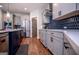 Modern kitchen with gray cabinets, hexagon tile backsplash and stainless steel appliances at 1291 Pleasant Grove Church Rd, Villa Rica, GA 30180