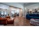 Open concept living area with hardwood floors and ample natural light at 1291 Pleasant Grove Church Rd, Villa Rica, GA 30180