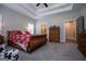 Large main bedroom with tray ceiling and en-suite bathroom at 1291 Pleasant Grove Church Rd, Villa Rica, GA 30180