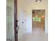 Bright foyer with decorative glass door and view into the living area at 2204 Happy Hollow Se Ct, Conyers, GA 30094