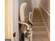 Stairlift provides easy access to upper levels of the home at 2204 Happy Hollow Se Ct, Conyers, GA 30094