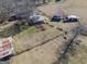 Aerial view of property with home, sheds and garden at 444 Agape Rd, Carrollton, GA 30116
