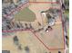 Aerial view showing house, pond, and multiple outbuildings at 444 Agape Rd, Carrollton, GA 30116