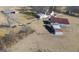 Aerial view of property with multiple buildings and horses at 444 Agape Rd, Carrollton, GA 30116