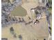 Aerial view of property with pond, barn, and house at 444 Agape Rd, Carrollton, GA 30116