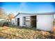 White barn with multiple stalls and wood storage at 444 Agape Rd, Carrollton, GA 30116