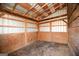 Spacious barn stall interior with wooden walls and dirt floor at 444 Agape Rd, Carrollton, GA 30116