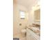 Bathroom with granite countertop vanity and tiled floor at 444 Agape Rd, Carrollton, GA 30116