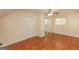 Bright bedroom with wood floors, closet, and ceiling fan at 444 Agape Rd, Carrollton, GA 30116
