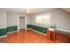 Spacious bedroom with wood floors, ceiling fan and closet at 444 Agape Rd, Carrollton, GA 30116