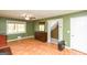 Bright bedroom featuring wood floors, a ceiling fan, and natural light at 444 Agape Rd, Carrollton, GA 30116