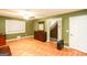 Spacious bedroom with wood floors, ceiling fan, and ample closet space at 444 Agape Rd, Carrollton, GA 30116