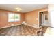 Bright dining area with tile flooring and view to backyard at 444 Agape Rd, Carrollton, GA 30116