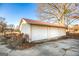Triple-car garage with white doors and red roof at 444 Agape Rd, Carrollton, GA 30116