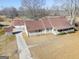 Aerial view of house with attached garage and driveway at 444 Agape Rd, Carrollton, GA 30116