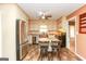 Updated kitchen with copper farmhouse sink and granite countertops at 444 Agape Rd, Carrollton, GA 30116
