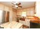 Spacious kitchen featuring granite countertops, stainless steel appliances, and ample cabinetry at 444 Agape Rd, Carrollton, GA 30116