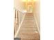 Clean carpeted staircase leading to the upper level at 444 Agape Rd, Carrollton, GA 30116
