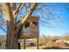 Wooden treehouse built into a large tree at 444 Agape Rd, Carrollton, GA 30116