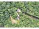 Two houses on a wooded lot with long driveway at 731 Airline Rd, Mcdonough, GA 30252