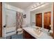 Bathroom with a bathtub, shower, and updated vanity at 731 Airline Rd, Mcdonough, GA 30252