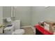 Small bathroom with toilet, sink, and vanity at 731 Airline Rd, Mcdonough, GA 30252