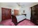 Charming bedroom with hardwood floors and a large wardrobe at 731 Airline Rd, Mcdonough, GA 30252