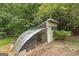 Chicken coop with attached run in the backyard at 731 Airline Rd, Mcdonough, GA 30252