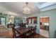 Open dining room with view of kitchen and living room at 731 Airline Rd, Mcdonough, GA 30252