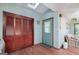 Home entryway with wood floors and built-in closet at 731 Airline Rd, Mcdonough, GA 30252