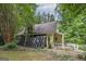 Yellow A-frame house with solar panels at 731 Airline Rd, Mcdonough, GA 30252