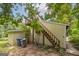 Home's exterior showcasing a deck and additional storage at 731 Airline Rd, Mcdonough, GA 30252